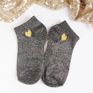 Chaussettes pailletés noires avec coeur doré